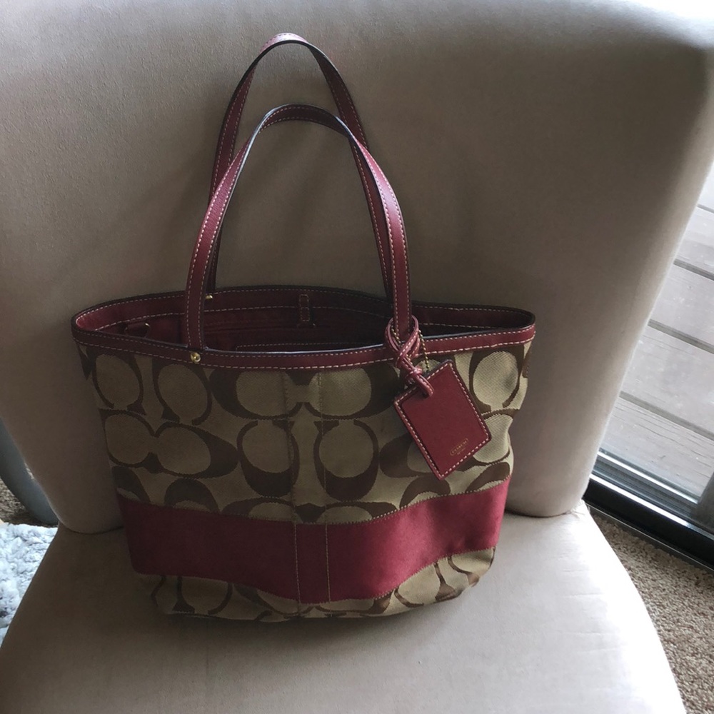 Red and brown Coach purse.